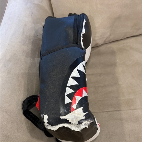 Sprayground Black and White Shark Backpack with Red Accents - Picture 2 of 7